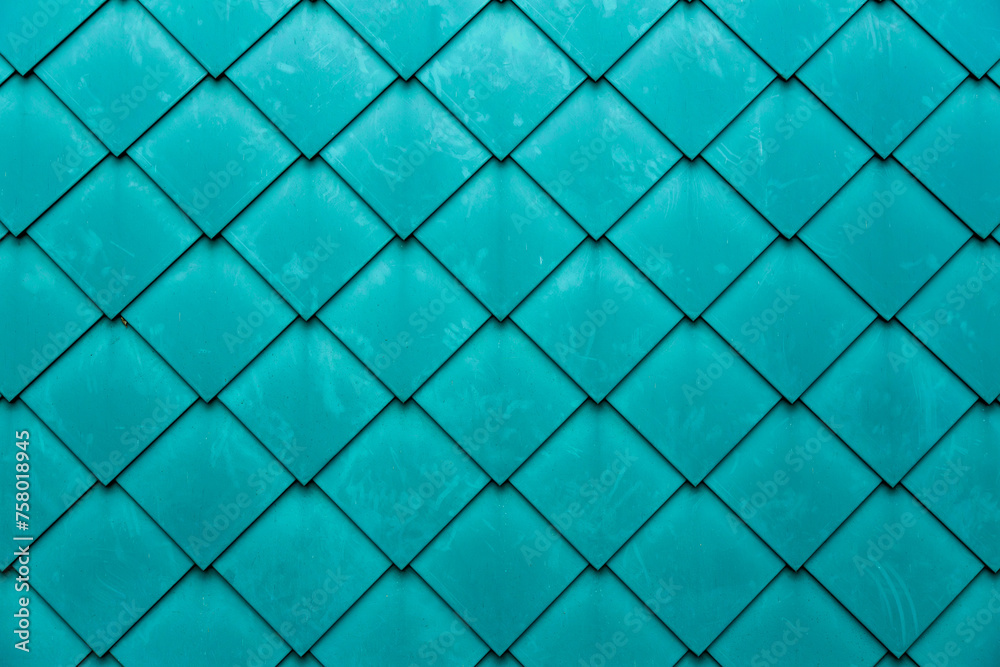 Diamond shaped fish scale tiled wall texture background