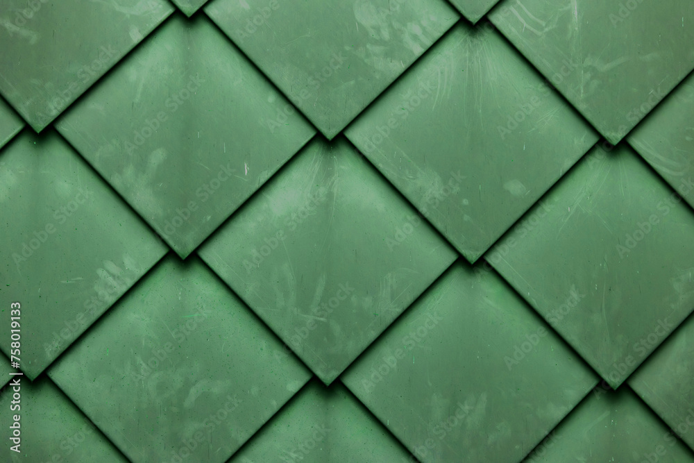 Diamond shaped fish scale tiled wall texture background
