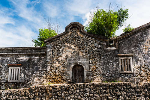 Old building view of a coral stone house in Villages of Penghu, Taiwan.