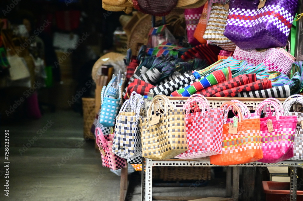 TW - 01.08.24: Gaojian Tongdian, a Dihua Street mainstay, sells wooden barrels, bamboo utensils, rattan and straw goods. The photo shows a close-up of their wares. TW - 01.08.24: Gaojian Tongdian, a Dihua Street mainstay, sells wooden barrels, bamboo utensils, rattan and straw goods. The photo shows a close-up of their wares.