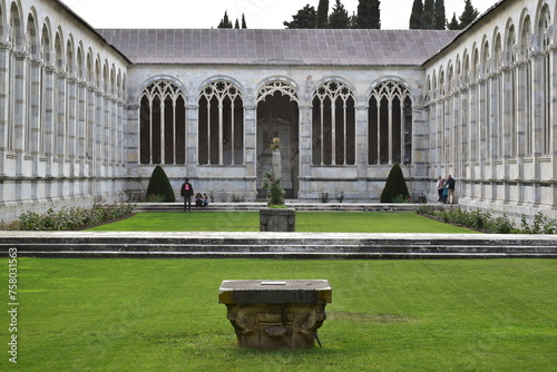 Obraz na płótnie The Camposanto is the last monument on Piazza del Duomo, its long marble wall flanking the northern boundary and completing its shape, Pisa. Italia w salonie