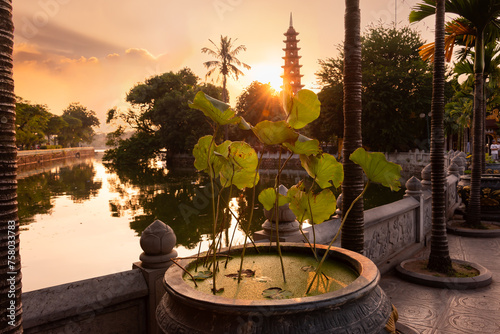 Sunset in Hanoi city, Vietnam with traditional buddist pagoda