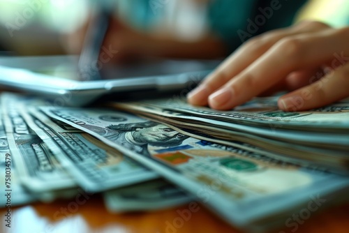 Detailed image of a person's hands counting a stack of dollar bills, emphasizing wealth and economy