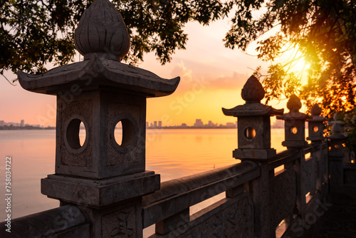 Beautiful sunset over lake in Hanoi city, Vietnam