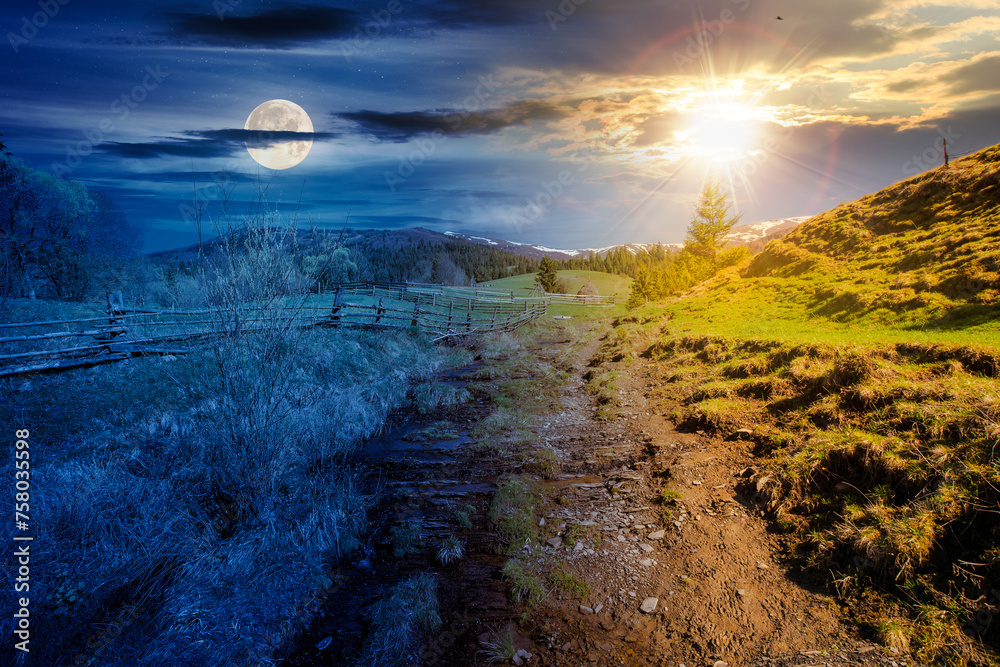 carpathian countryside scenery on spring equinox. mountainous rural landscape beneath a sky with sun and moon. day and night time change concept