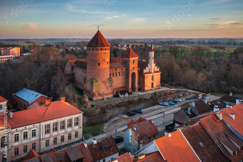 Fototapeta Naklejka Na Ścianę i Meble -  Teutonic castle in Reszel at sunset, Poland.