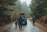 Family and SUV on a foggy forest road.