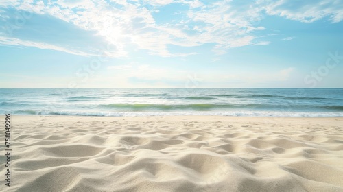 Beautiful scene features empty sandy beach with sea background