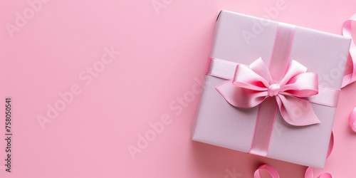 luxury gift box with silk and ribbon pink pastel background copy space © pickypix