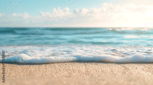 Close-up, empty sand with blurred beach background