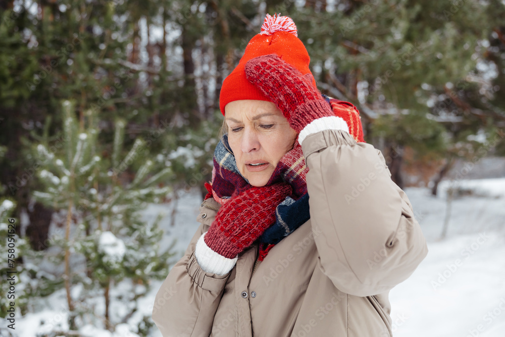 Waist up of a woman in red having headache Waist up of a woman in red having headache