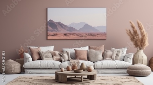 Boho ethnic living room  rustic coffee table by white sofa, brown pillows, two poster frames on wall photo