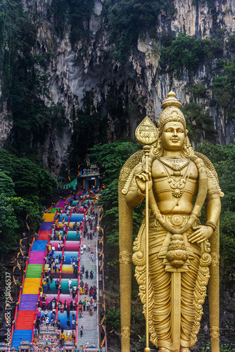 Batu Caves, Hindu Temple with colorful stairs in Kuala Lumpur, Malaysia.  Batu Caves is also known as Murugan Temple, the most popular tourist attraction in Malaysia.