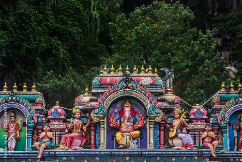 Colorful Hindu Statutes at Batu Caves, Kuala Lumpur, Malaysia. Batu Caves is the most popular tourist attraction 