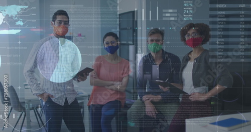 Image of financial data processing over diverse business people wearing face masks