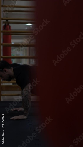 man doing stand, push-up