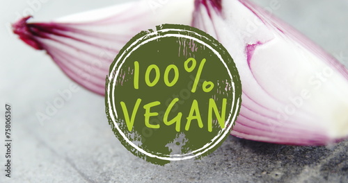 Image of 100 percent vegan text over close up of red onions