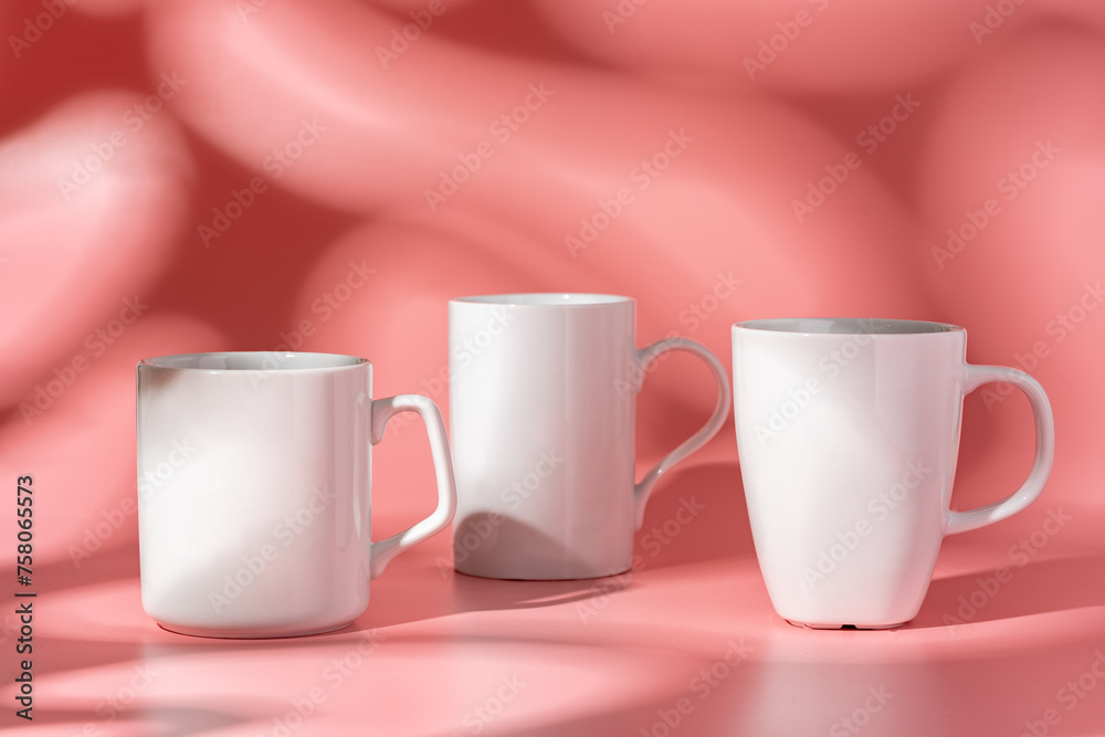 Ceramic mug mock up on pink background studio shot Ceramic mug mock up on pink background studio shot
