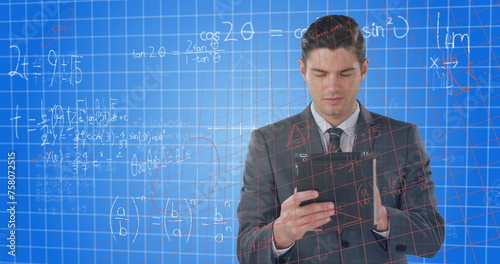 Mathematical equations against caucasian businessman using digital tablet against blue background