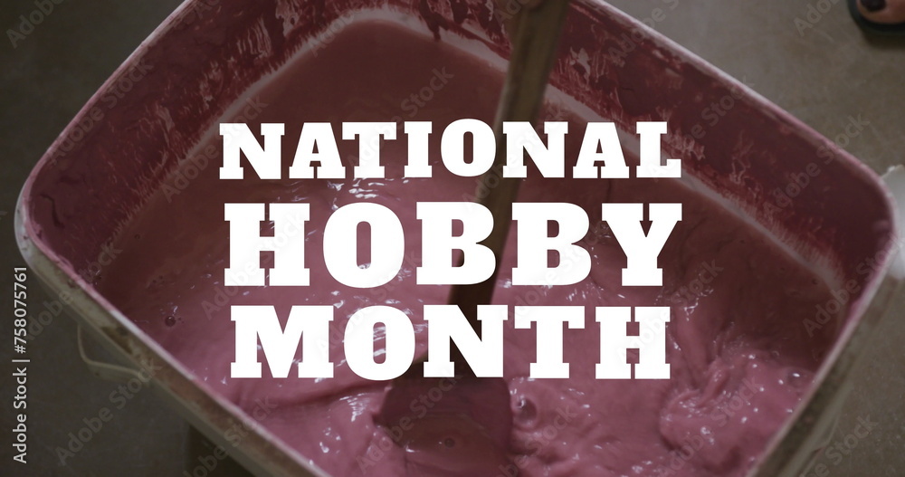 Obraz premium Image of national hobby month text with hands of caucasian woman mixing paint