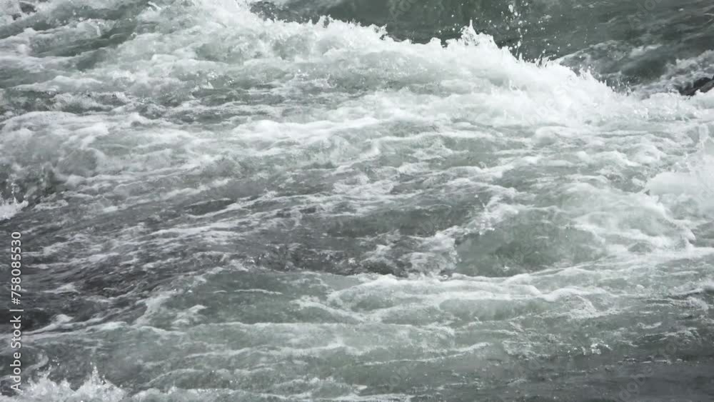 Very fast flowing water at the famous Godafoss waterfall in Iceland. Very fast flowing water at the famous Godafoss waterfall in Iceland.