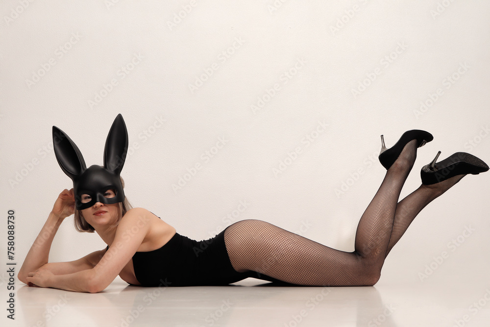 slim woman in sexy lingerie and bunny mask - obrazy, fototapety, plakaty 