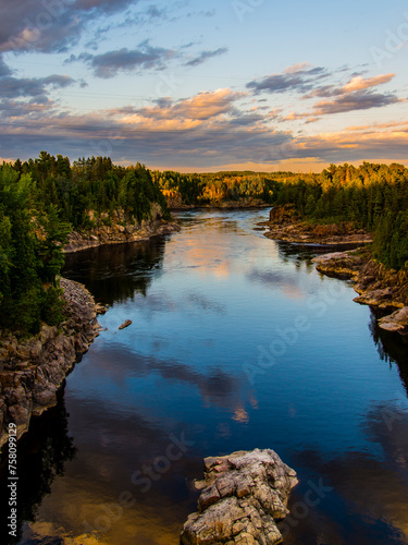 Saguenay, Canada - August 14 2019: Saguenay river Golden Sunset view near Saguenay City