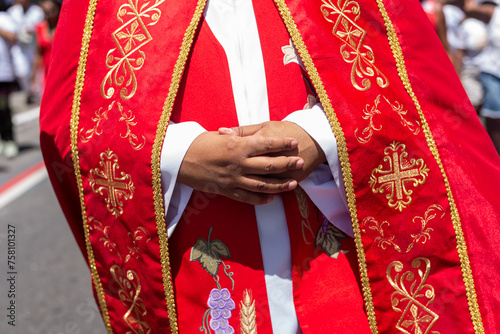 Priests are seen participating in the procession in tribute to Santa Luzia in the city of Salvador, Bahia. photo