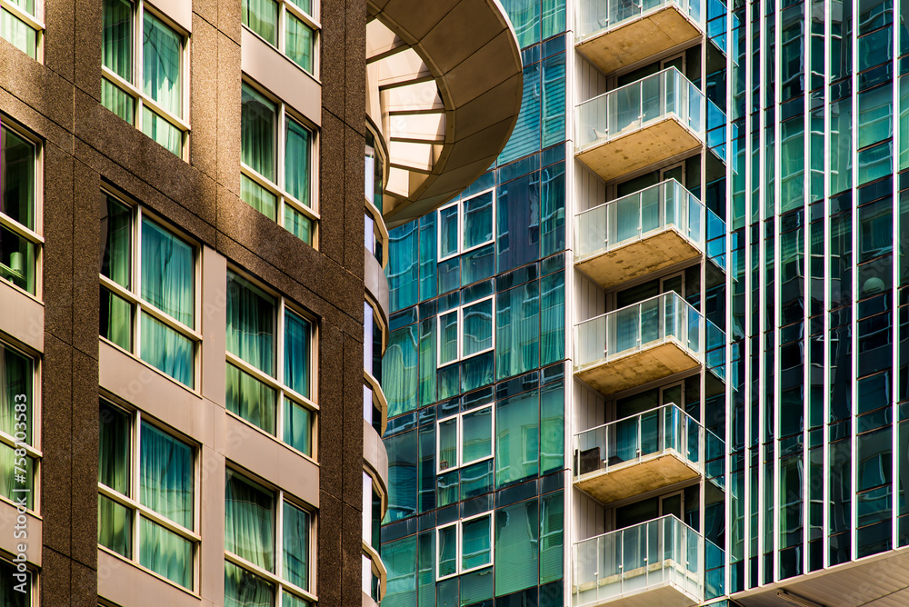 Fototapeta premium Montreal, Canada - July 7 2019: The high curtain wall skyscraper building in downtown Montreal