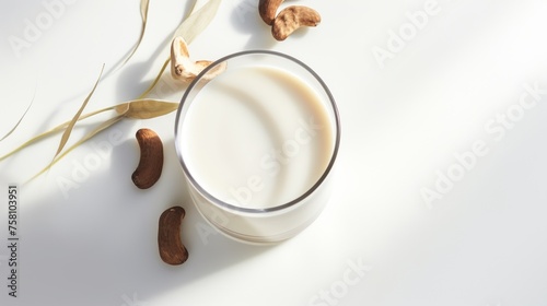 Glass of Fresh Nut Milk on white Background