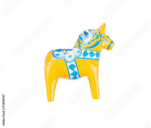 Swedish traditional souvenir wooden Dala or Dalecarlian horse, yellow colored, isolated on white photo