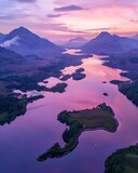 Aerial Sunset Majesty: Loch Hena Tiko's Serene Waters Amid Misty Mountains, Bathed in Twilight's Pastel Hues