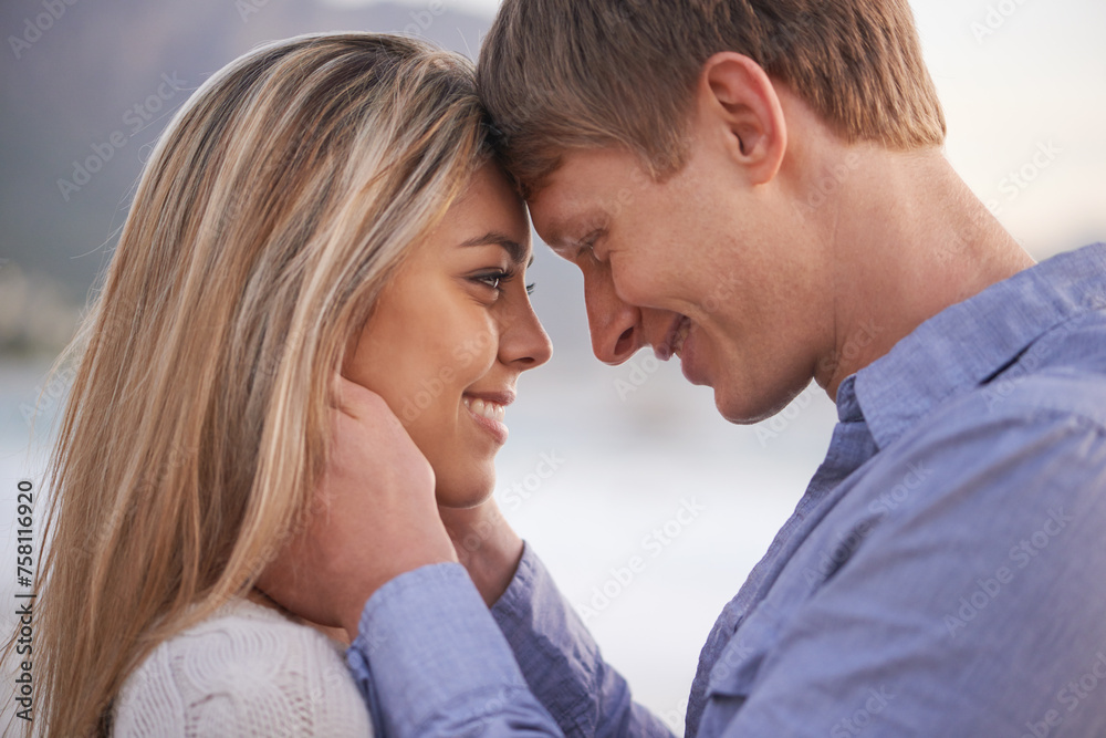 Couple, forehead and touch with smile in outdoor for love with romance in honeymoon, vacation and affection in Australia. Relationship, holiday and happy with bonding for trust, support and care Couple, forehead and touch with smile in outdoor for love with romance in honeymoon, vacation and affection in Australia. Relationship, holiday and happy with bonding for trust, support and care