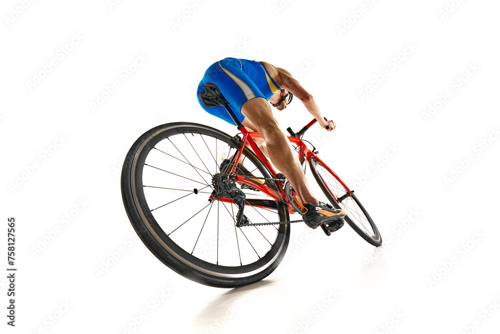 Obraz premium Bottom view dynamic image of man, athlete, cyclist in motion riding on bike isolated on white studio background. Concept of sport, active and healthy lifestyle, speed, endurance, hobby