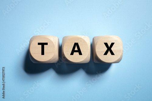 Tax written in wooden block letters