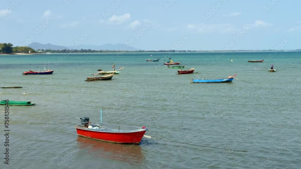  small fishing boat is moored on the ground 