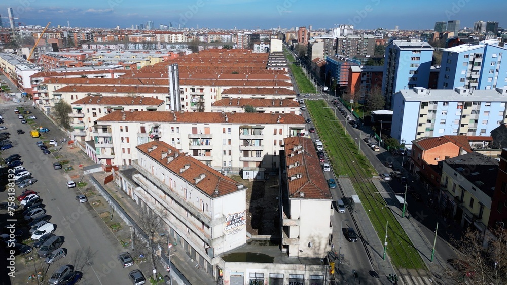 Italy, Milan 03-14-2024 Aler public housing blocks to be demolished in the suburban neighborhood of Giambellino Lorenteggio - Drone view of occupied poor homes - urban redevelopment of the suburbs