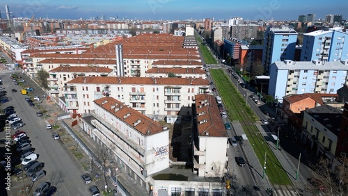 Obraz na płótnie Italy, Milan 03-14-2024 Aler public housing blocks to be demolished in the suburban neighborhood of Giambellino Lorenteggio - Drone view of occupied poor homes - urban redevelopment of the suburbs w salonie