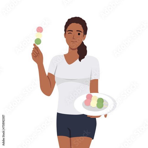 Young black woman eating japanese china street food dango balls.