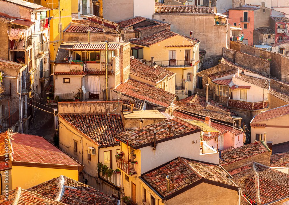 poor district of latin or european ghetto in a provincial town, urban area with yellow old ancient buildings poor district of latin or european ghetto in a provincial town, urban area with yellow old ancient buildings