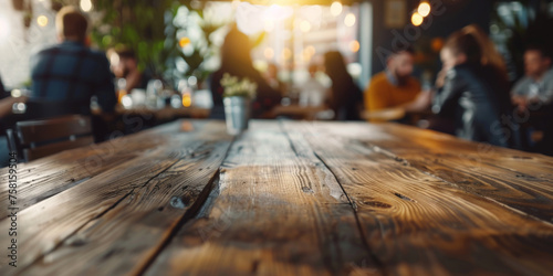 Empty wood table top with blurred background of people sitting in a coffee shop, fast food restaurant or pub for product display montage. Concept for advertising design, layout presentation.banner © Planetz