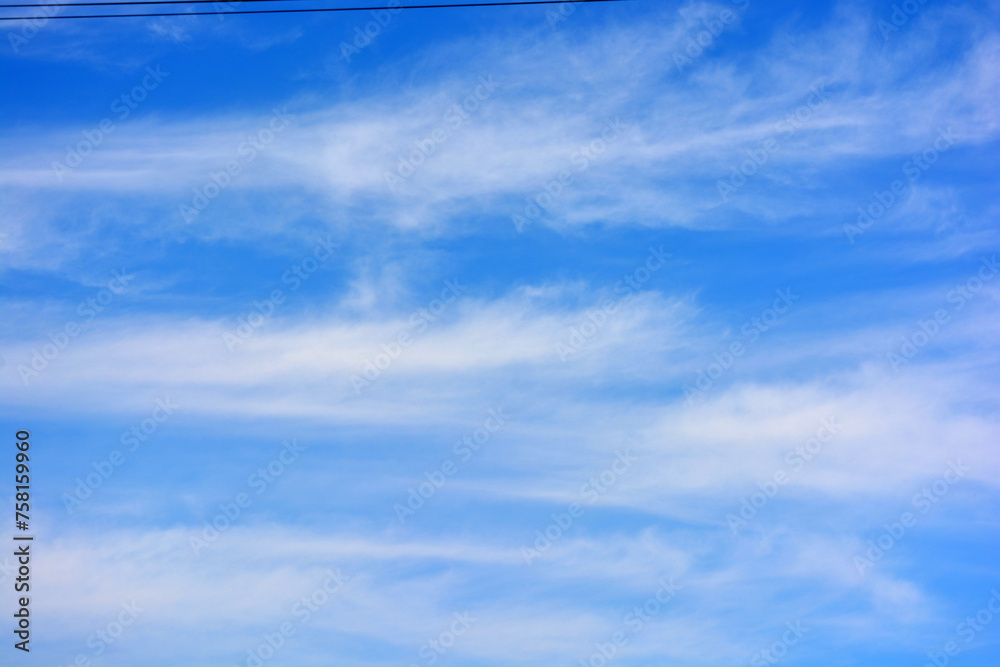Beautiful and unusual nature, bright light blue sky with small white clouds. Beautiful and unusual nature, bright light blue sky with small white clouds.