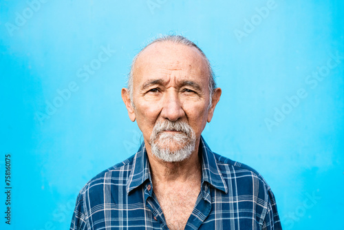 Portrait of a Senior man looking into the camera - Elderly people lifestyle concept