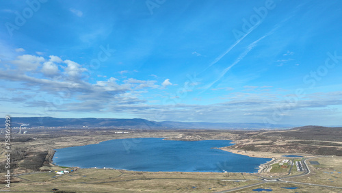 Lake Most lignite coal brown anthropogenic pond water created result reclamation former territory drone aerial Stary Most district city Ustecky Region, mine recreational tourist travel Europe