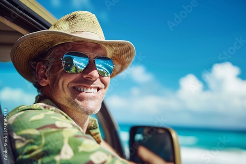 A smiling man embarking on a summer vacation journey by car, ready to hit the open road, with a vibrant blue sky in the background