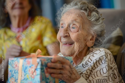 An elderly woman receiving a surprise birthday gift from her family, her eyes widening with delight as she unwraps the beautifully wrapped present