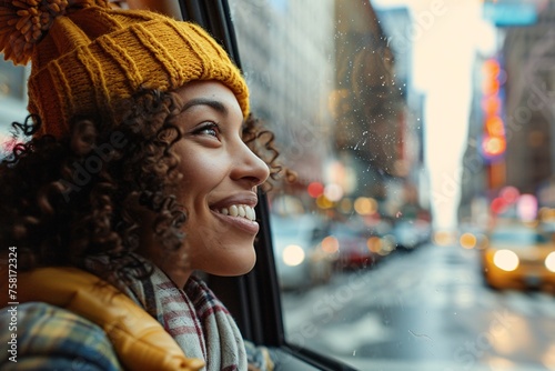 A happy black woman traveler gazing out of a taxi window, taking in the sights of the city as they make their way to the bus station for a holiday adventure © Maelgoa