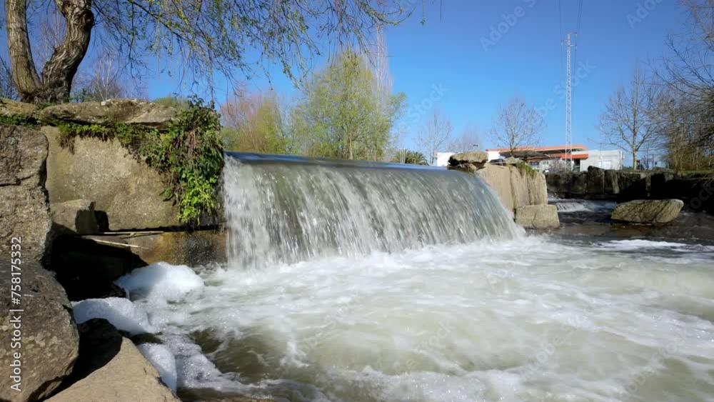 Waterfall on the Caster River in the City Park of Ovar. Waterfall on the Caster River in the City Park of Ovar.