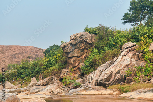 rustic nature landscape with primitive  rock formations in river bed of Telwa and nearby Dharara waterfalls in Simultala  Bihar. This landscape is part of Chota Nagpur Plateau.
