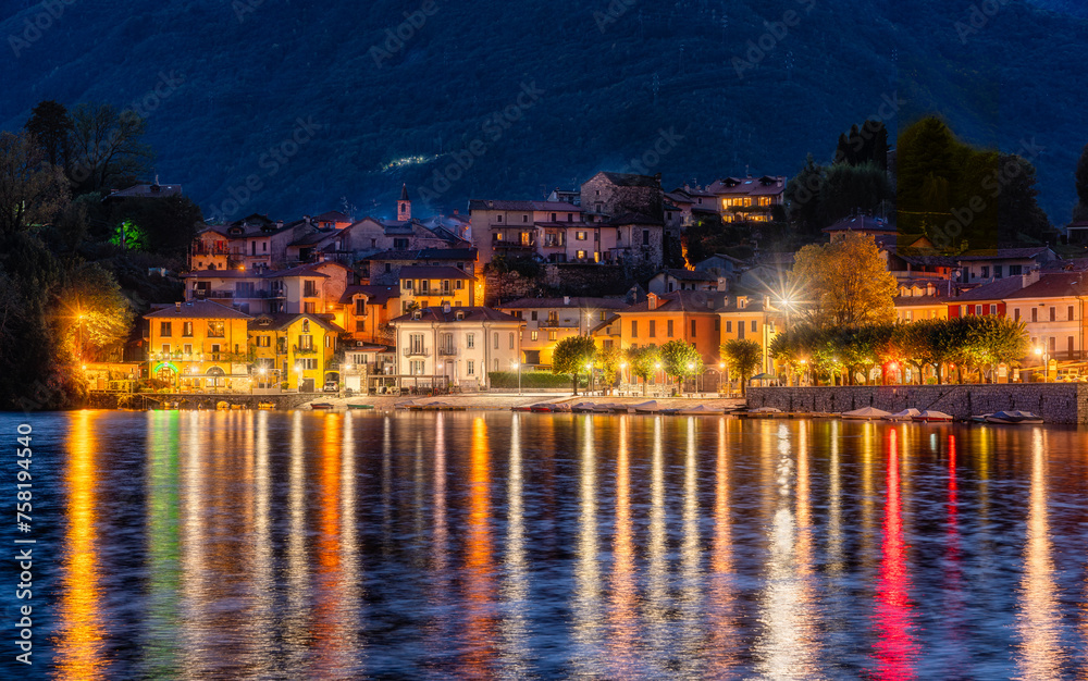 The beautiful village of Mergozzo, illuminated in the evening. Piedmont region, northern Italy.